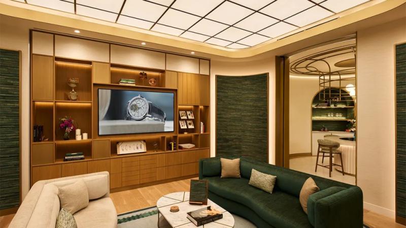 二楼的VIP休息室以绿色为主色调，与中庭的植物墙相呼应。