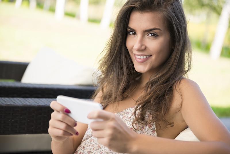 Beautiful woman texting